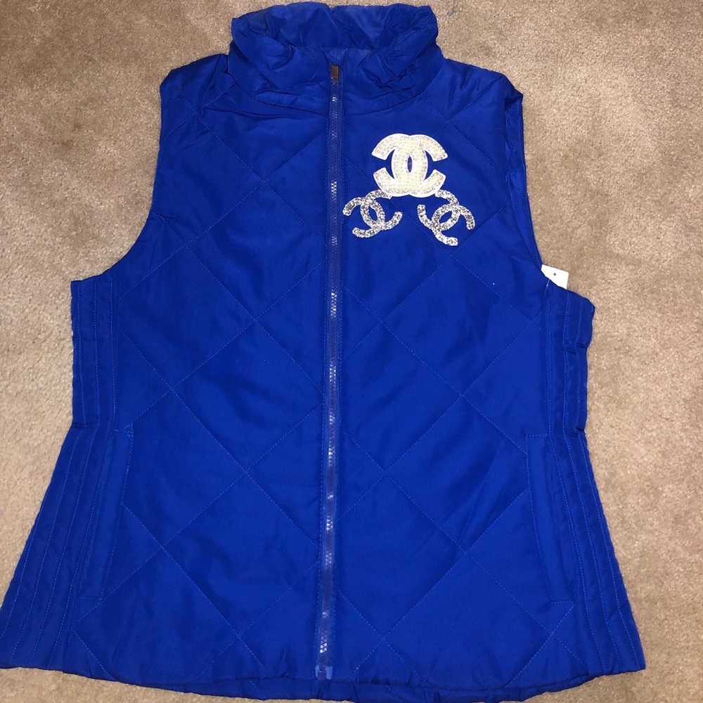 Customized puffer vests and beanies.